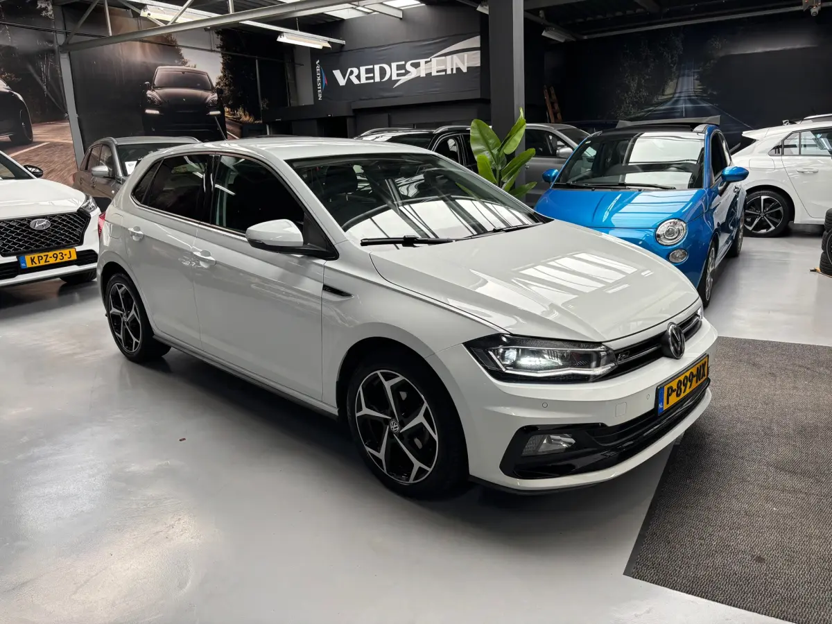 Polo 1.0 TSI Highline Business R / Carplay