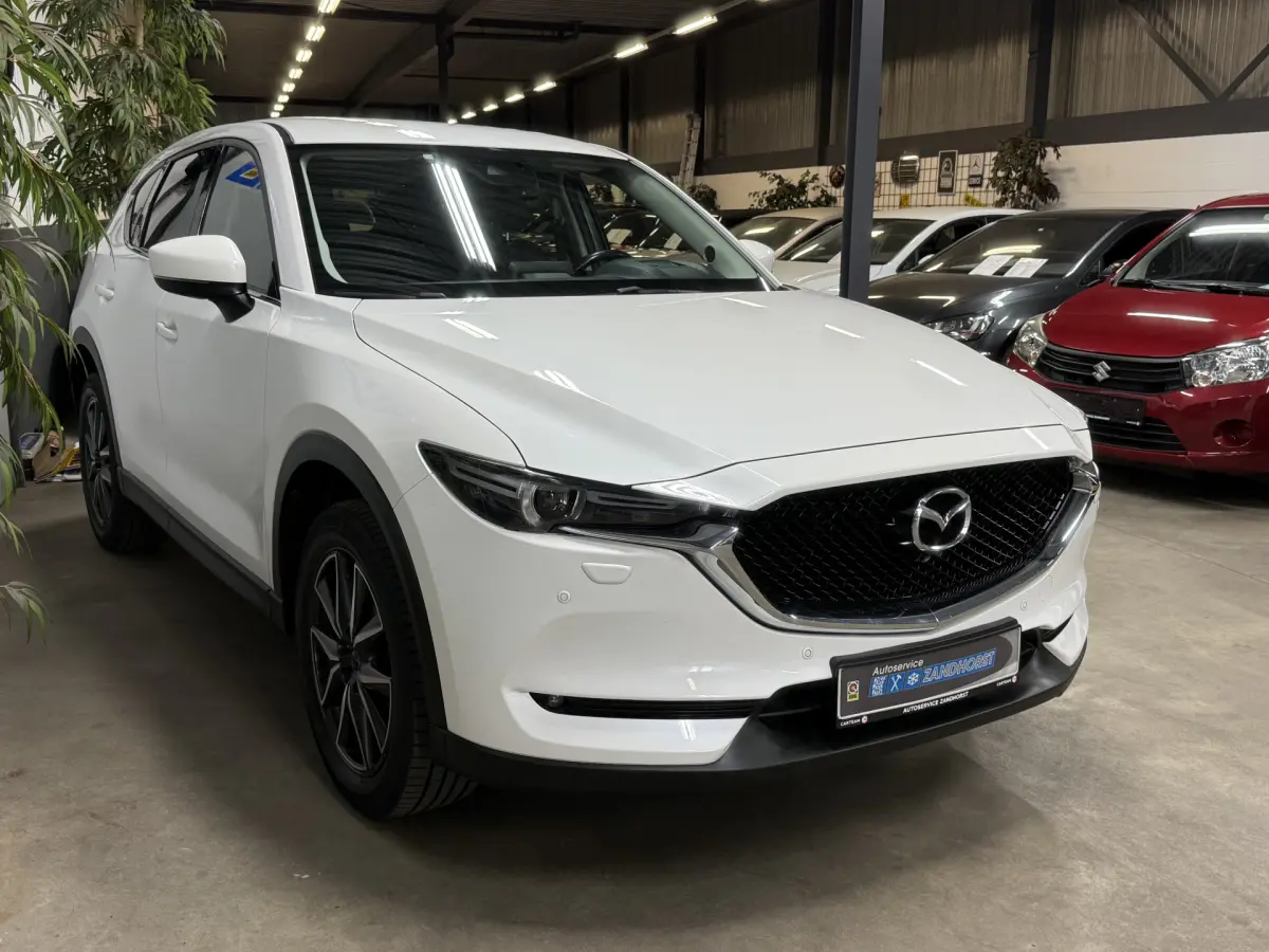 CX-5 2.0 SkyActiv-G 165 Skylease Luxury // Bose // Leer // Head-up
