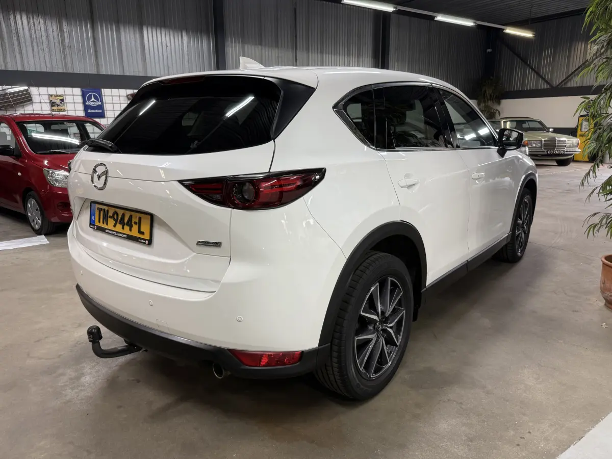 CX-5 2.0 SkyActiv-G 165 Skylease Luxury // Bose // Leer // Head-up